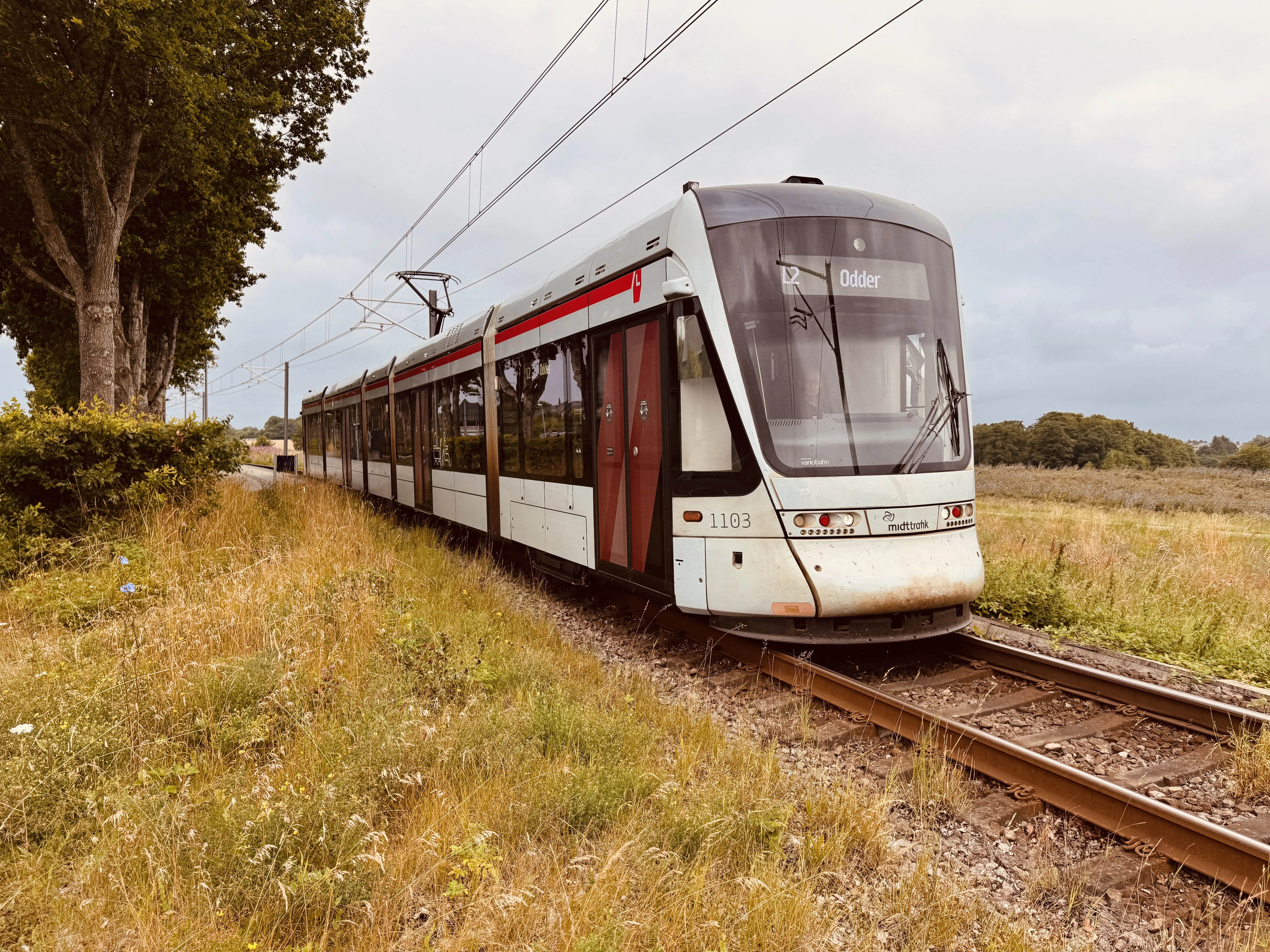 Billede af Aarhus Letbane togsæt 1103 fotograferet ud for Nørrevænget Letbanestation. Billede af Aarhus Letbane togsæt 1103 fotograferet ud for Nørrevænget Letbanestation.